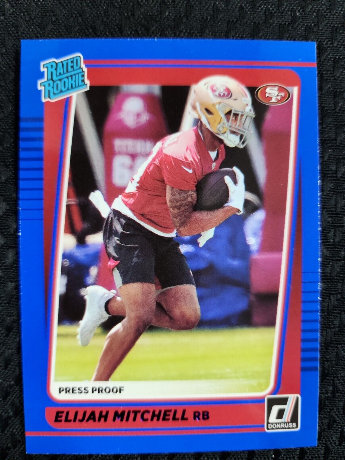 Elijah Mitchell 2021 Panini Donruss Football #312 Rated Rookie Press Proof Blue
