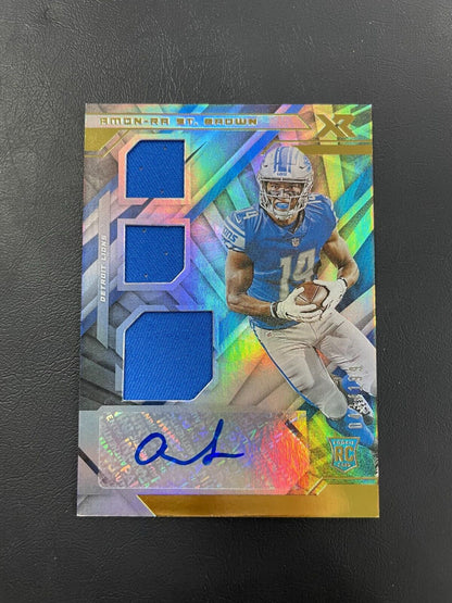 2021 Panini XR Amon-Ra St. Brown Auto Rookie Patch /199 Lions RC